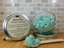 Load image into Gallery viewer, The Irish Linen Foot Scrub is like fresh linen snapping crisply in a feisty breeze, sharp and clean, warmed by the sun and loving hands.  A floral blend with violets.